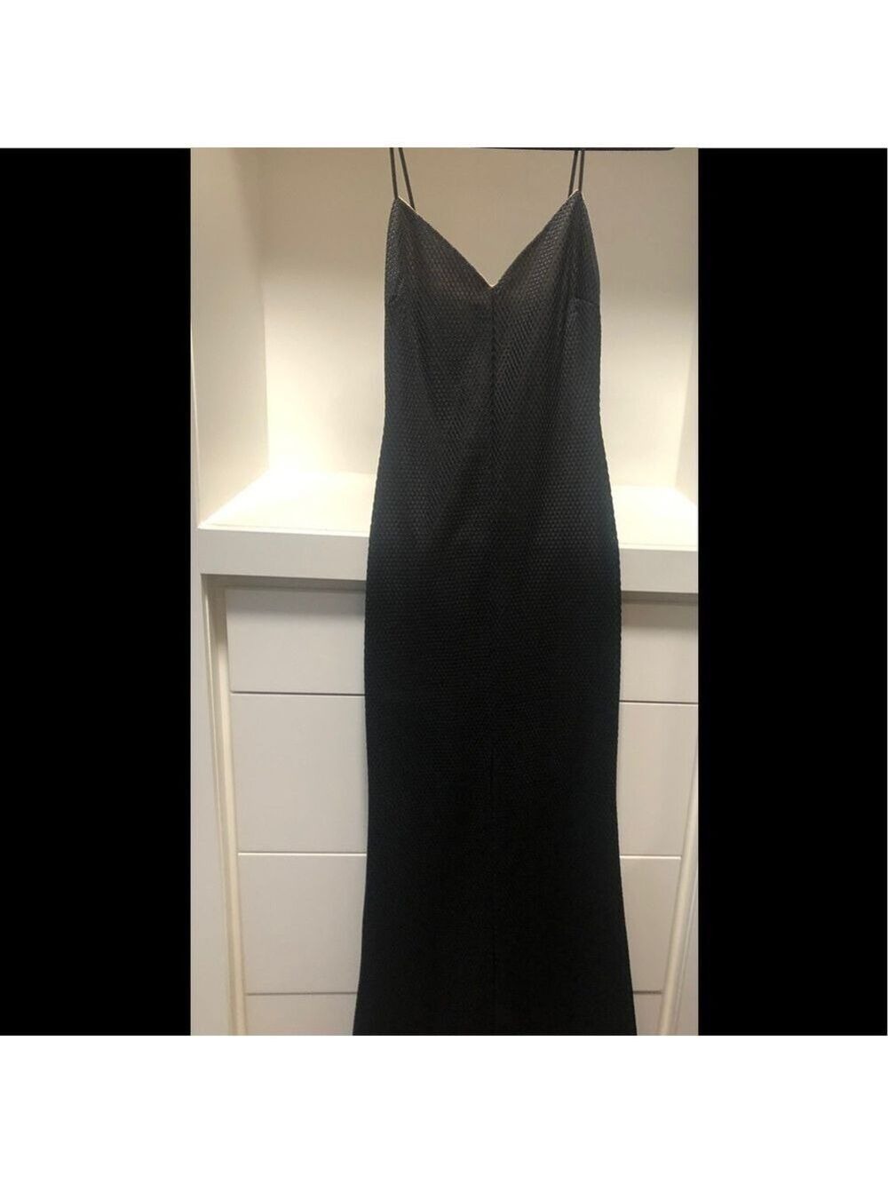La petit garçon black gown